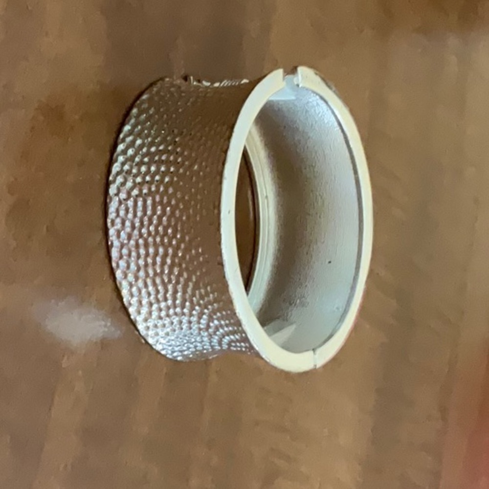 Hammered shiny sterling silver wide cuff bracelet.